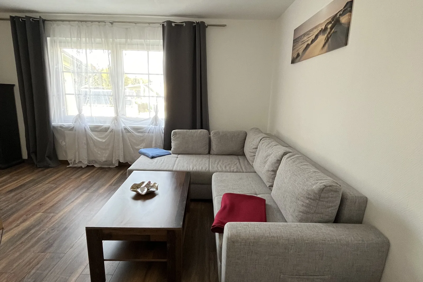 Ferienwohnung 6, Ferienhaus Ostsee YOLO: Wohnzimmer mit Schlafcouch